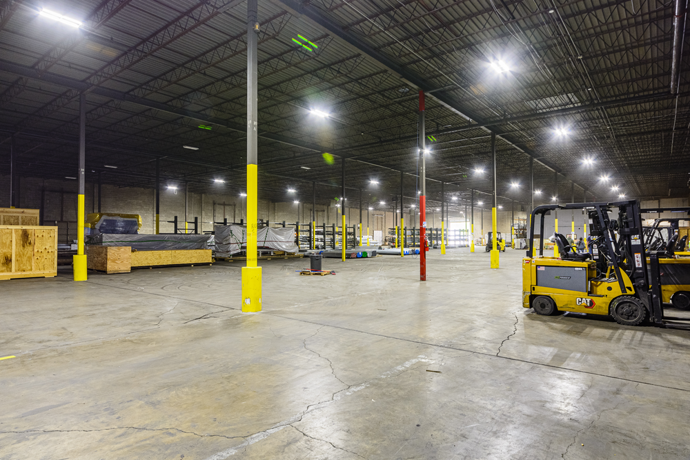 Open warehouse floor at CTW Logistics with forklift equipment